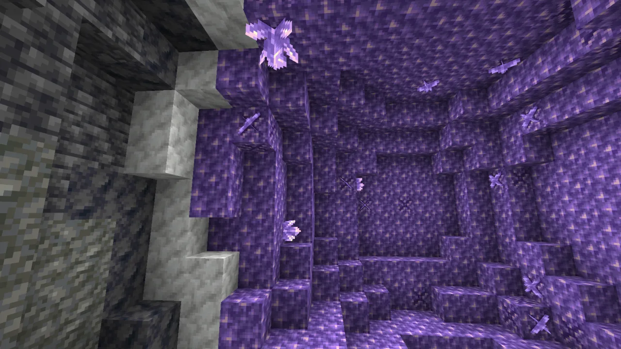 Interior view inside a hollow Amethyst Geode showing purple crystal clusters growing on budding amethyst walls