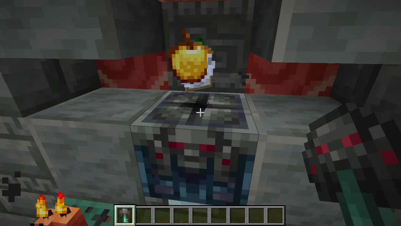 Player unlocking an Ominous Vault with a glowing red Ominous Key and obtaining a Heavy Core