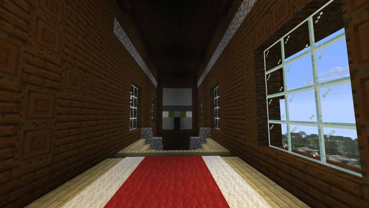 Player inspecting a giant wool Illager Head statue inside a 3rd-floor mansion room